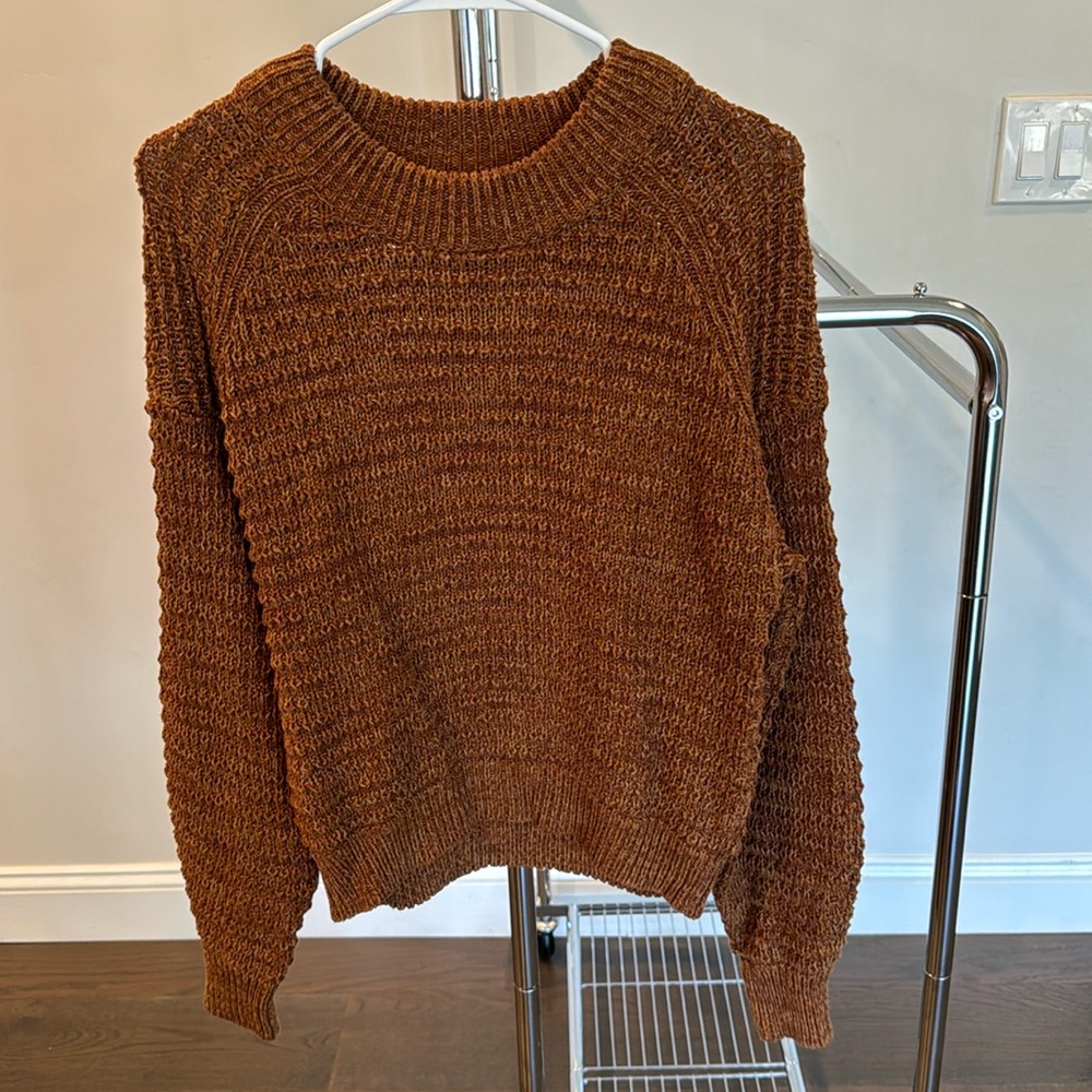 Brown long sleeve sweater. Never worn.
